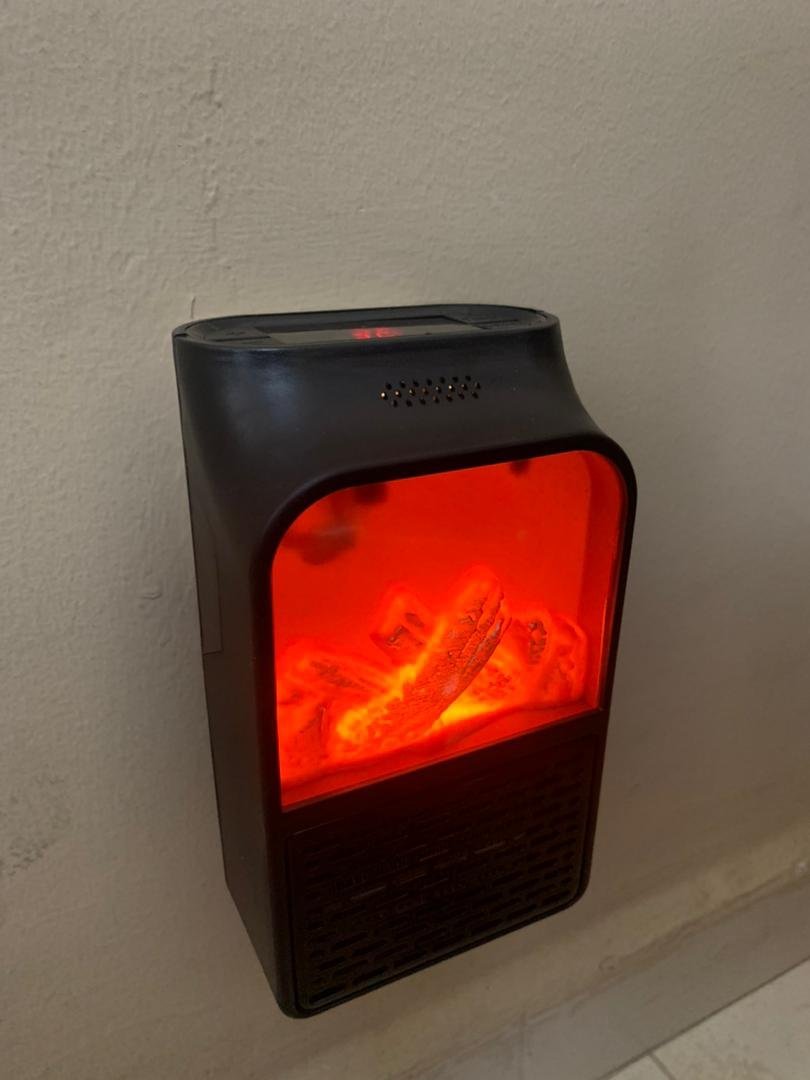 ⁦Chauffage Électrique Portable avec Effet Flamme 3D – مدفأة كهربائية محمولة بتأثير اللهب ثلاثي الأبعاد⁩ - الصورة ⁦4⁩